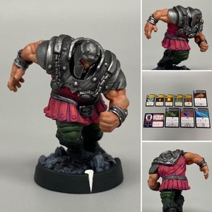 Miniatura de Ram Man pintada y tarjetas de juego para el juego Masters of the Universe Battleground, de Archon Studio.