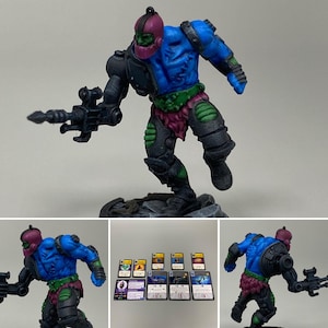 Miniatura de Trap Jaw pintada y tarjetas de juego para el juego Masters of the Universe Battleground, de Archon Studio.