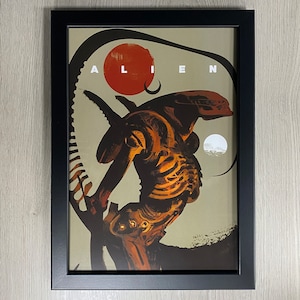 Framed Alien, Movie Art. 1979 Science Fiction Horror Film, Starring Sigourney Weaver and Harry Dean Stanton Directed By Ridley Scot.