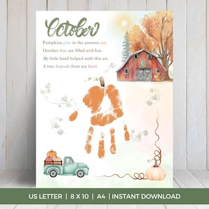 May include: A printable art sheet featuring the text October, Pumpkins glow in the autumn sun, October days are filled with fun, My little hand helped make this art, A tiny keepsake from my heart. Includes a red barn, a teal truck with pumpkins, and a central orange handprint pumpkin design.