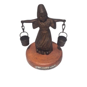 Bronze Belgum Lady Statue