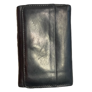 Cartera de cuero negro para hombre