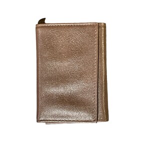 Cartera triple de piel de flor superior
