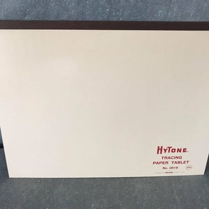 May include: A white tracing paper tablet with a brown top edge. The tablet is labeled "HyTone Tracing Paper Tablet No. 2818".