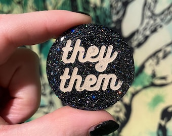 sparkly black pronoun pins/ keychain/ magnet she her he him they them
