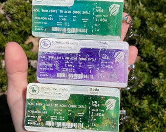 boarding pass keychains- loopcoopshop green resin animal crossing gift game dodo new leaf horizons handmade purple blue cute bright acnh
