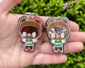 Tom Nook tanooki keychains- loopcoopshop green resin animal crossing gift game new leaf horizons handmade acnh cute bright raccoon brown