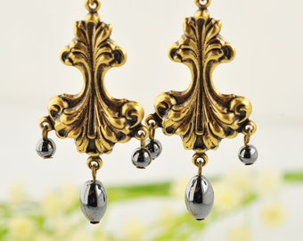BOUCLES of baroque style earrings garnished with hematite beads