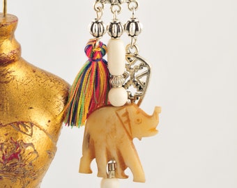 BOUCLES of elephant and pompom earrings