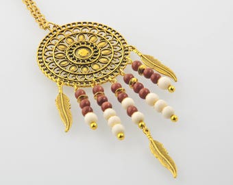 golden necklace with pendant natural pearls feathers