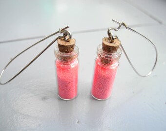 BOUCLES vials and neon pink sequins