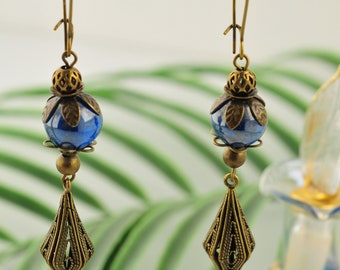 BOUCLES of bronze bright blue beads