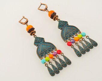 BOUCLES in carved copper and colored beads