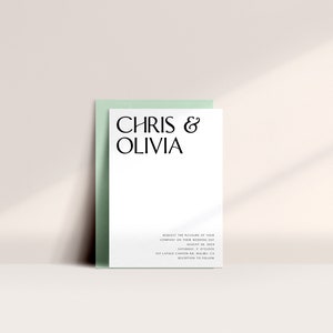 May include: A white wedding invitation with the names "CHRIS & OLIVIA" in black, elegant font. The invitation is set against a light green envelope. Additional text at the bottom provides wedding details. The overall aesthetic is minimalist and modern.
