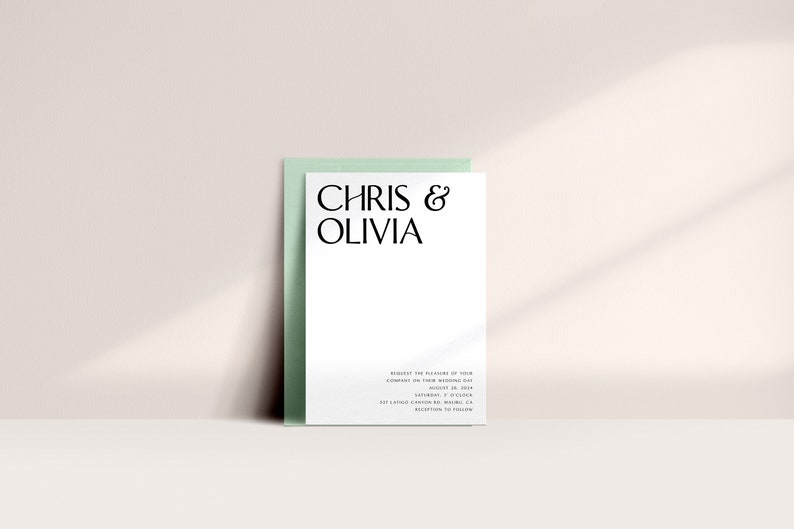 May include: A white wedding invitation with the names "CHRIS & OLIVIA" in black, elegant font. The invitation is set against a light green envelope. Additional text at the bottom provides wedding details. The overall aesthetic is minimalist and modern.