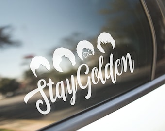 May include: White vinyl decal with five silhouettes of the character 'The Golden Girls' and the text 'Stay Golden'.