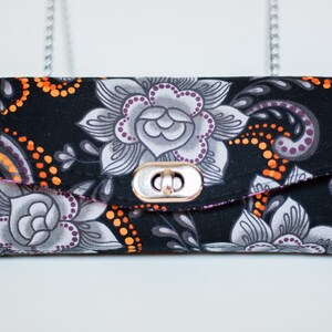 Carteras NCW para mujer, con capacidad para 24 tarjetas, 2 bolsillos con cremallera, correa de hombro de 91 cm y cierre giratorio.