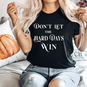 Don&#39;t Let The Hard Days Win Kurzärmeliges Unisex T-Shirt