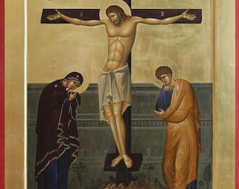 May include: A religious icon depicting the crucifixion of Jesus Christ. The icon is painted in a traditional style with gold accents. Jesus is depicted on the cross with his arms outstretched. Mary, the mother of Jesus, is kneeling on the left side of the cross, and John the Apostle is kneeling on the right side of the cross. The icon is set against a gold background.