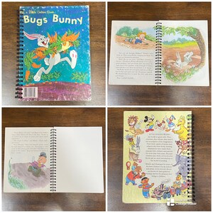 May include: A set of four spiral bound notebooks with colorful covers featuring cartoon characters. The covers feature Bugs Bunny, Mickey Mouse, Donald Duck, and a yellow bird. The text on the covers reads "A Little Golden Book" and "Little Golden Books".