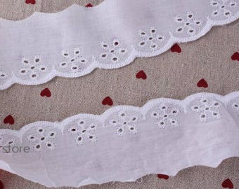 White cotton broderie Anglaise lace