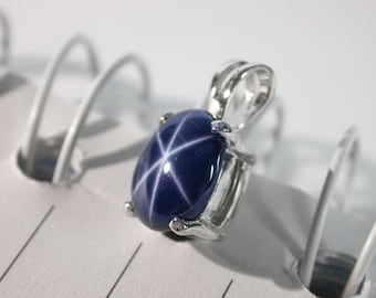 Natural blue star sapphire pendant sterling silver.