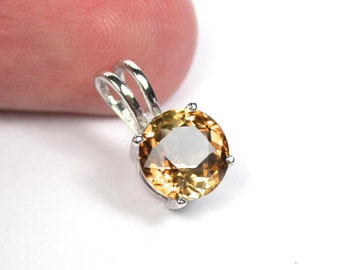 Unheated 7.5 mm. Natural imperial topaz pendant sterling silver.