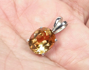 11x9 mm Natural imperial topaz pendant sterling silver.