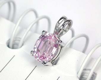 Natural pink kunzite pendant sterling silver. 9.0 x 7.0 mm.
