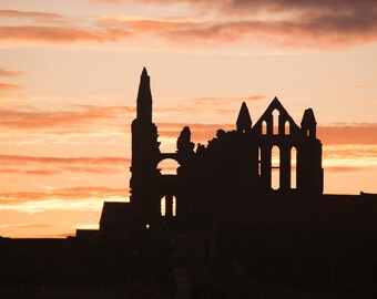 Sunrise over Whitby Abbey, Photograph of Whitby Abbey, Whitby, North Yorkshire by Paul Bassindale by Paul Bassindale