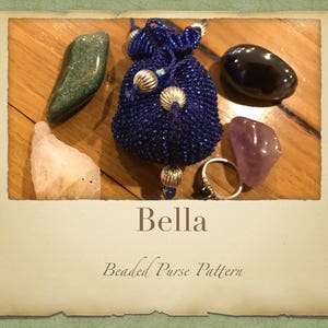 May include: A blue beaded purse with silver accents, surrounded by various stones, including a green stone, a clear stone, a black stone, and a purple stone. The image is titled "Bella Beaded Purse Pattern".