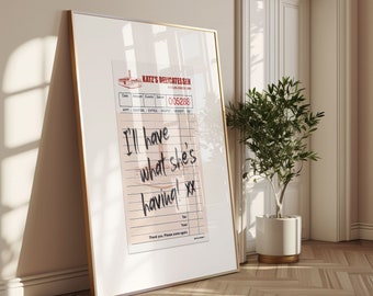May include: A framed print of a Katz's Delicatessen receipt with the handwritten message "I'll have what she's having! xx".