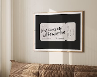 May include: A framed black and white print of a ticket with the text "What comes next will be marvellous" and "Fred Again" printed on it.