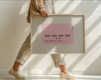 May include: A framed print of a pink credit card with the text "NEED MONEY FOR BIRKIN" and the numbers "0000 0000 0000 0000 00 / 00".