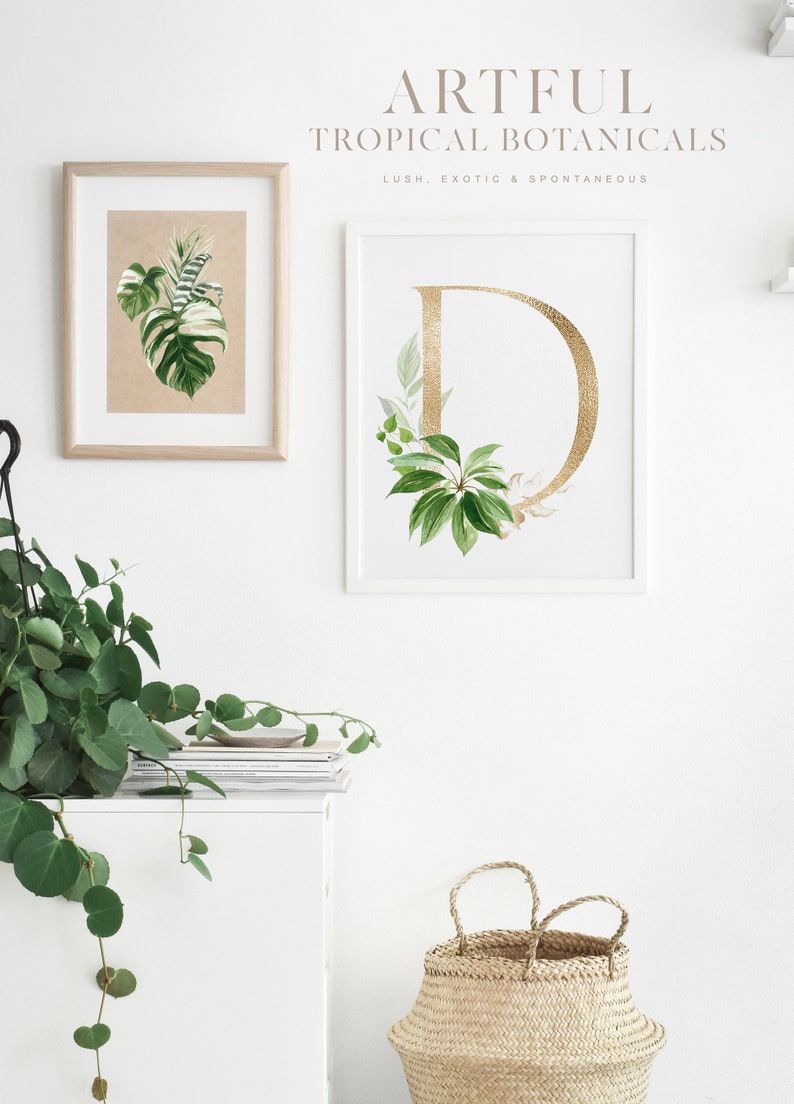 Puede incluir: Dos impresiones enmarcadas con fondo blanco. La impresi&oacute;n de la izquierda presenta una hoja tropical verde y blanca. La impresi&oacute;n de la derecha presenta una letra D dorada rodeada de hojas tropicales verdes. El texto "ARTFUL TROPICAL BOTANICALS LUSH, EXOTIC & SPONTANEOUS" est&aacute; en la parte superior de la imagen.