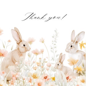 May include: A watercolor illustration of three bunnies in a field of pink, yellow, and white flowers. The text "Thank you!" is written in cursive at the top of the image.