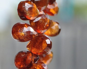 Hessonite garnet faceted pear briolettes 10-11mm - 4 stones