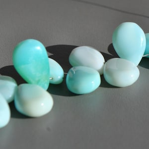 Cabochon (n°42) ovale d'Opale Welo blanche d'Ethiopie 0,46 cts | UK Cabochon (n°42) ovale d'Opale Welo blanche d'Ethiopie 0,46 cts | UK