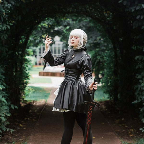 Alter Saber cosplay costume. Black dress. Fate