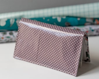 Checkbook door / purple passport with white polka dots