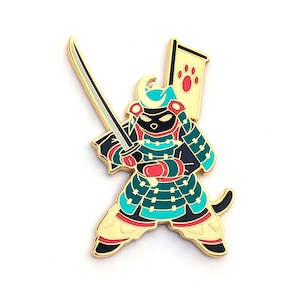 May include: A gold-colored pin featuring a cartoon dog in samurai armor, holding a sword and a banner with a paw print. The dog's armor is teal, red, and black, with a gold helmet and accents. The pin is set against a white background.