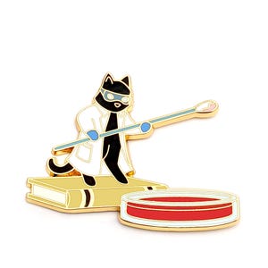 May include: A black cat wearing a white lab coat and goggles is holding a stirring rod over a red liquid in a petri dish. The cat is standing on a stack of books.