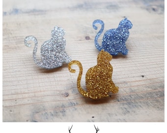 Broche de gato brillante