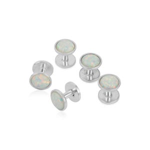 May include: Set of five silver cufflinks with white opal stones.