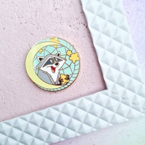 Pins inspired by Meeko in Pocahontas