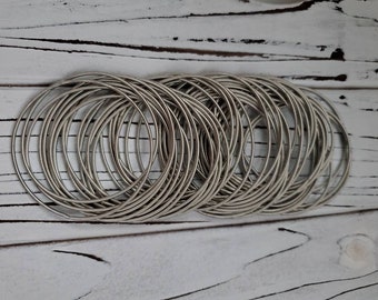 unisex stainless steel spring bangle bracelets, guitar string bracelets, multi-layer stainless steel bangles, adjustable layered bracelets