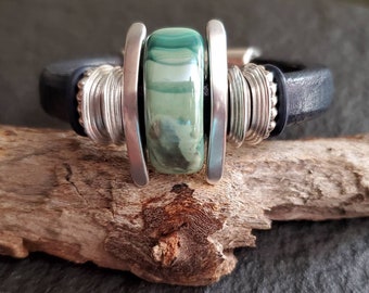 Navy blue thick leather bracelet, aqua green ceramic bead + leather bracelet, silver + leather beaded slider bracelet, stacking bracelet