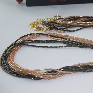 NECKLACE MULTI rows mini peach and brown beads