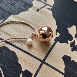 Pregnancy bola, natural freshwater pearl, lurex cord