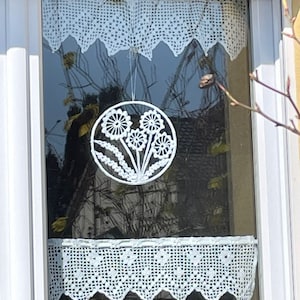 Handmade window decoration with crochet